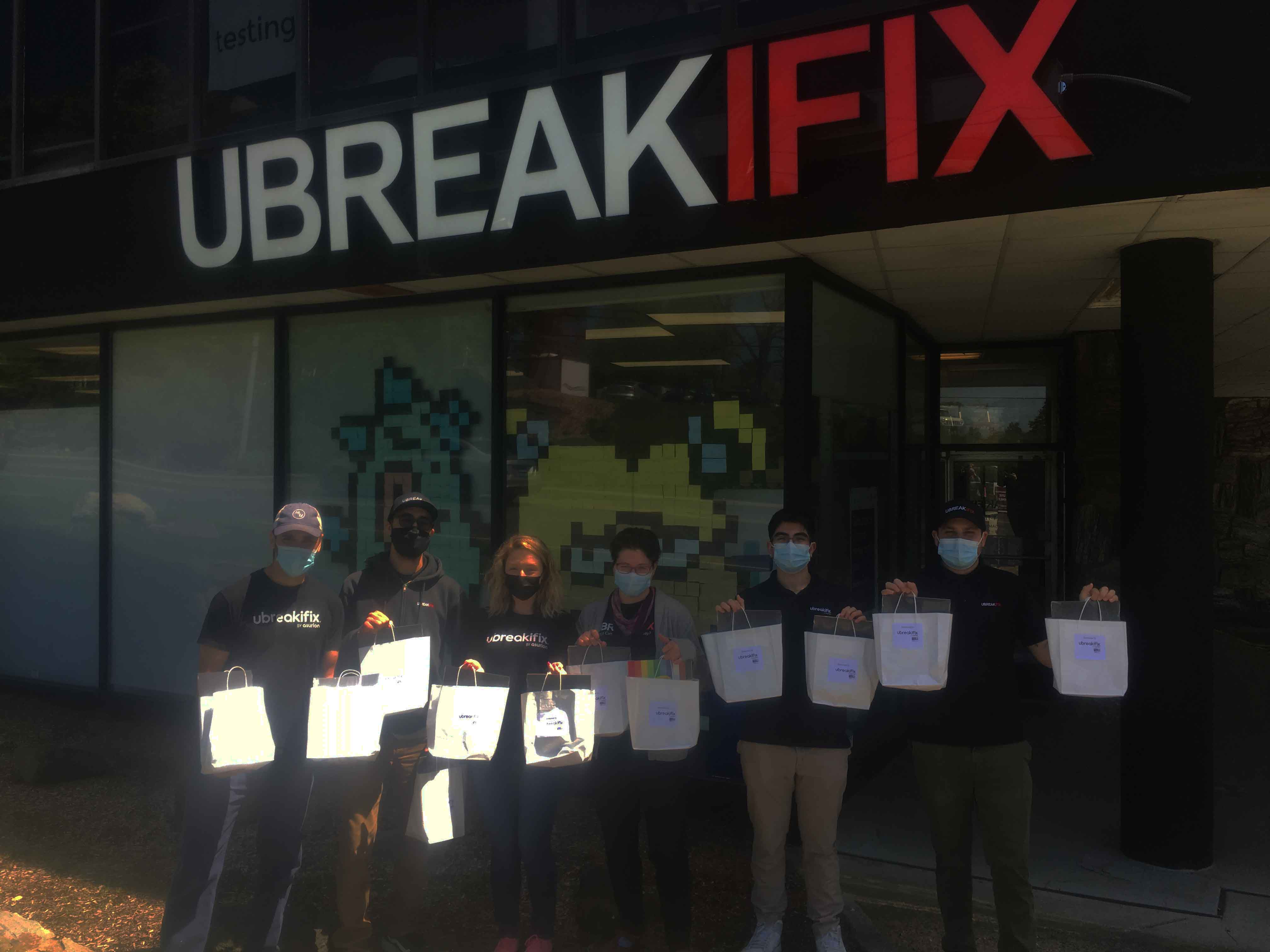 uBreakiFix employees delight preschoolers by building literacy learning kits!